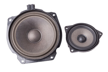 Two speakers of an acoustic system - an audio for playing music in a car interior on a white isolated background in a photo studio. Spare parts for auto repair in a workshop or for sale for tuning