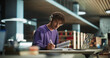 Handsome European Student Studying in a Traditional Library. Young Male Wearing Headphones, Working on an University Research Project, Reading Academic Textbook and Journals Online