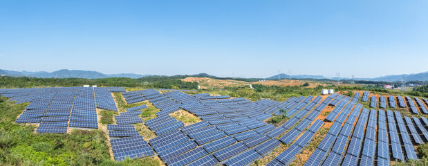 Poster - panoramic view of solar power station on hillside