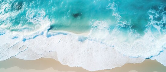 Wall Mural - Majestic Ocean Wave Approaching Serene Beach Shore with Golden Sand