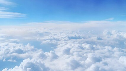 Wall Mural - a view of the clouds from an airplane window on a sunny day