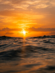 Wall Mural - scenic sunrise view from the ocean surface.
