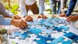 © ProstoSvet - Business team collaboratively working on a puzzle, metaphor for teamwork in project planning.