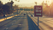 Direction Amidst Motion: Lone 'One Way' Sign Beside a Busy American Highway