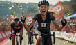 © RobertNyholm - Professional female road cyclist celebrating the tour win - big crowd and gold confetti