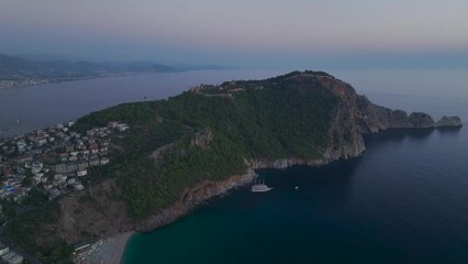 Wall Mural - Sunset over Alanya Castle and Marina from a drone, Alanya, Turkish Riviera on Mediterranean Coast, Antalya, Turkey