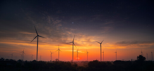 Wall Mural - electric wind turbine farm in the morning and starburst.wind energy, electricity production plant. h