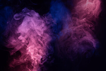 Wall Mural - Blue and pink steam on a black background.