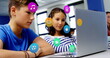 Image of colorful icons over diverse schoolchildren using laptop