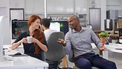 Canvas Print - Woman, man and talking with coffee at office in morning with smile for ideas, teamwork and questions. Business people, happy and discussion for collaboration with diversity in corporate workplace