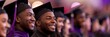 © olga_demina - Group of joyful graduates in purple gowns at graduation ceremony