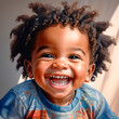 3-year-old boy, African-American, laughing merrily