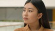 © Yuliia - Portrait thoughtful pensive Asian woman dreaming chinese japanese girl relaxed korean businesswoman think ponder imagine looking in side close up head shot ethnic lady thinking future dream pondering