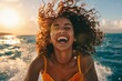 A black woman with an infectious laugh, reveling in the thrill of a speedboat ride along the coastline, the spray of the sea and the wind in her face adding to the sense of excitement and adventure