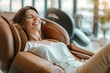 Joyful woman relaxing in an airport massage chair, her birthday relaxation session underway before her flight
