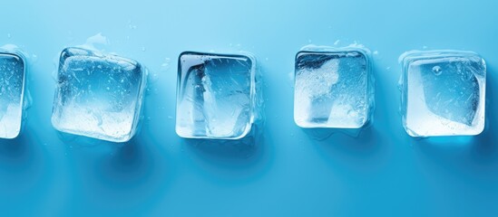 Poster - Chilled Refreshment - Ice Cubes Arranged Neatly on Vibrant Blue Background