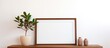 © AkuAku - A rectangular picture frame is displayed on a wooden shelf alongside a houseplant in a flowerpot and vases. The fixture complements the treethemed event decor