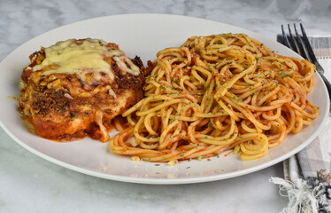 Wall Mural - chicken parmesan  served with spaghetti and sauce