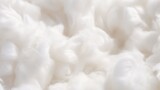 Fototapeta  - A close up of a pile of white cotton. Suitable for textile industry concepts