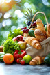 Fresh fruits, vegetables and bakery products in a grocery bag