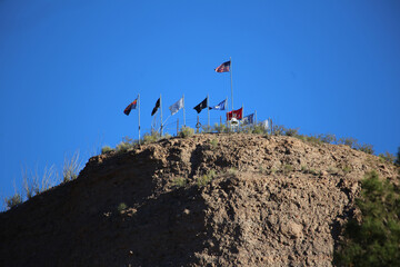 Canvas Print - American Flags on a Cliff