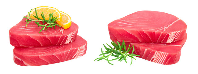 Wall Mural - Fresh tuna fish fillet steak with rosemary and lemon isolated on white background with full depth of field