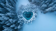 A lake in the winter forest landscape in the shape of a heart.