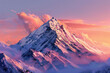 A snowy mountain peak at sunrise, the sky painted in shades of pink and orange