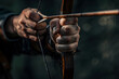 a archer's hands drawing back the bowstring and releasing the arrow with focus and precision