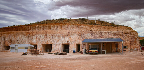 hillside entrance to a dug out, an underground house in the opal mining town of coober pedy in the o