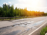 Fototapeta Przestrzenne - Potholes on bad asphalt road. Closeup