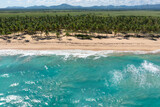 Fototapeta Przestrzenne - Tropical beach with resorts, palm trees and caribbean sea. Travel. Dominican Republic. Aerial view