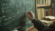 A person writing on a blackboard with a marker. Suitable for educational and business concepts