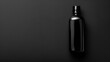 Elegant matte black bottle on a dark background