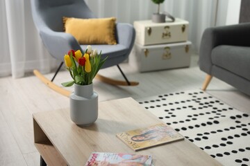 Canvas Print - Beautiful tulips in vase on coffee table indoors, space for text