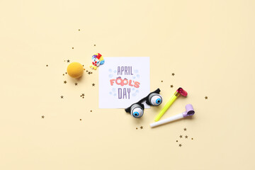 Sticker - Festive postcard for April Fools Day with funny glasses and party decor on beige background