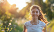 Positive young woman taking a jog in nature