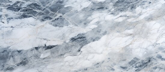 Wall Mural - A detailed view of a swirling blue and white marble texture resembling water, snow, and ice cap patterns under a sky backdrop, suggestive of freezing wind waves and fluid movement on a sloped surface