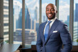 © keystoker - African american man in a suit standing confidently in front of a window, embodying a commanding presence, businessman. Copy space.