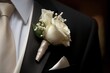 Close-up of a flower being worn as a boutonniere.