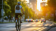 © lermont51 - Cyclist riding on city road with urban skyline backdrop, rear view