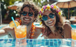 Photograph of a happy young couple relaxing by the pool with drinks and leis wearing beach attire