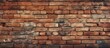 © The 2R Artificiality - A detailed closeup of a brown brick wall showcasing numerous rectangular bricks. The building material is a composite material called brickwork