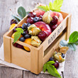 Fresh fruits in a wooden crate