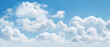 A wide view of the cloudscape of thick white clouds layered with a bright clear blue sky weather atmosphere created with Generative AI Technology