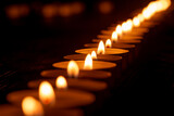 Fototapeta Mapy - Lighting a candle in memory of someone is a simple lit candles in memory of those who have passed away