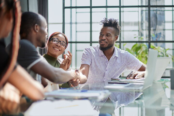 African american hr team welcoming female applicant at job interview