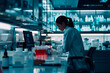 © yaqui_villegas - Lab worker engaged in operating sophisticated equipment in a clean and controlled laboratory