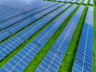 Solar farm and sun light. Solar power for green energy. Sustainable renewable energy. Photovoltaic power station or solar park. Solar panel installation and maintenance concept. Energy sustainability.