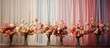flowers in vases on table with curtain backdrop